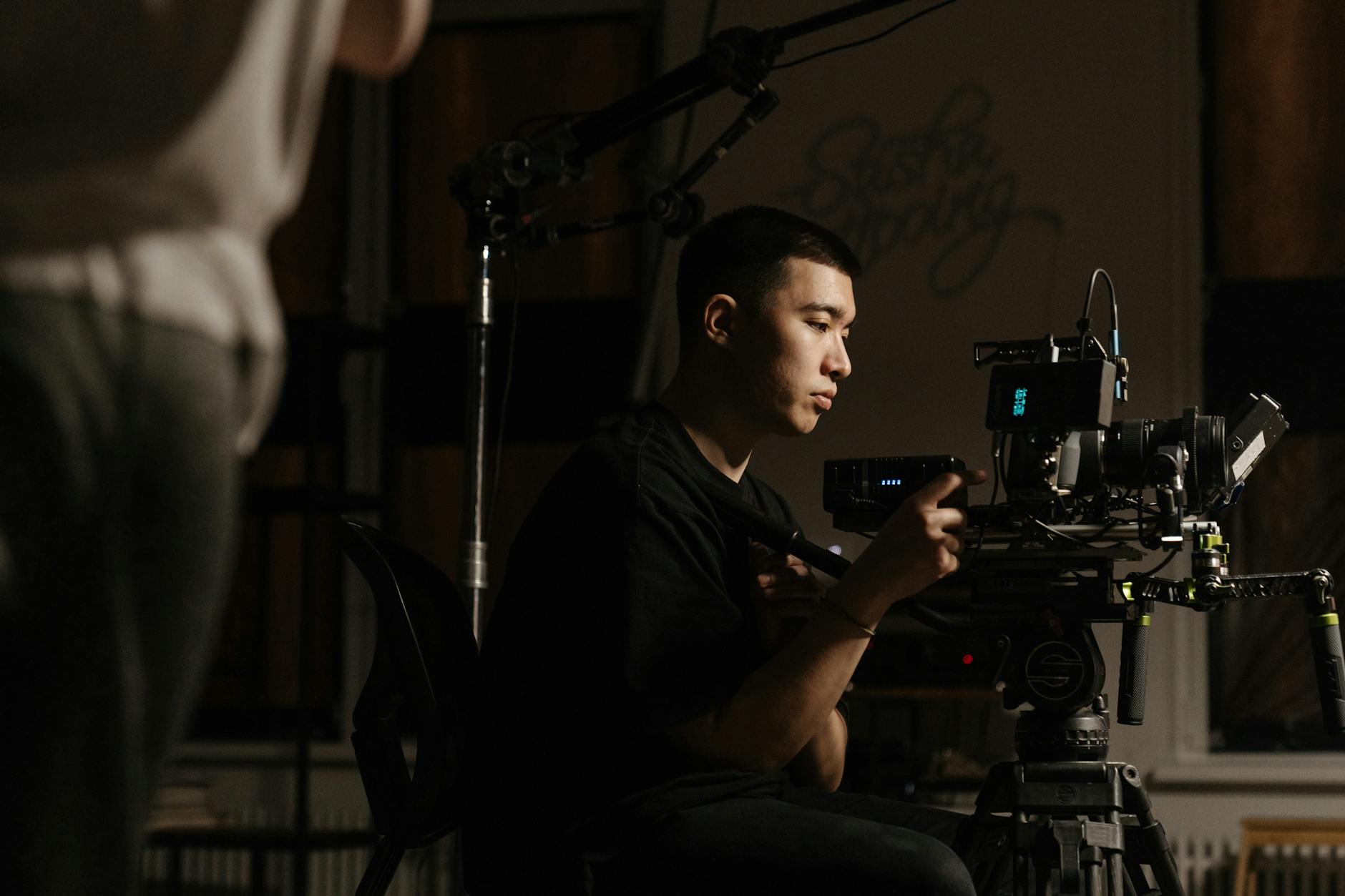 Film crew working on location with professional camera equipment